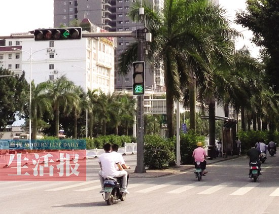 南寧交警試點管理非機動車 單車電動車有了信號燈